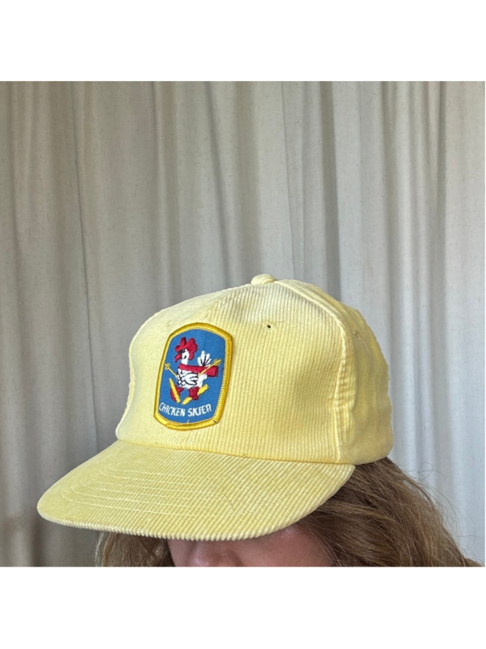 “Chicken Skier” Flat Bill Baseball Cap in butter yellow